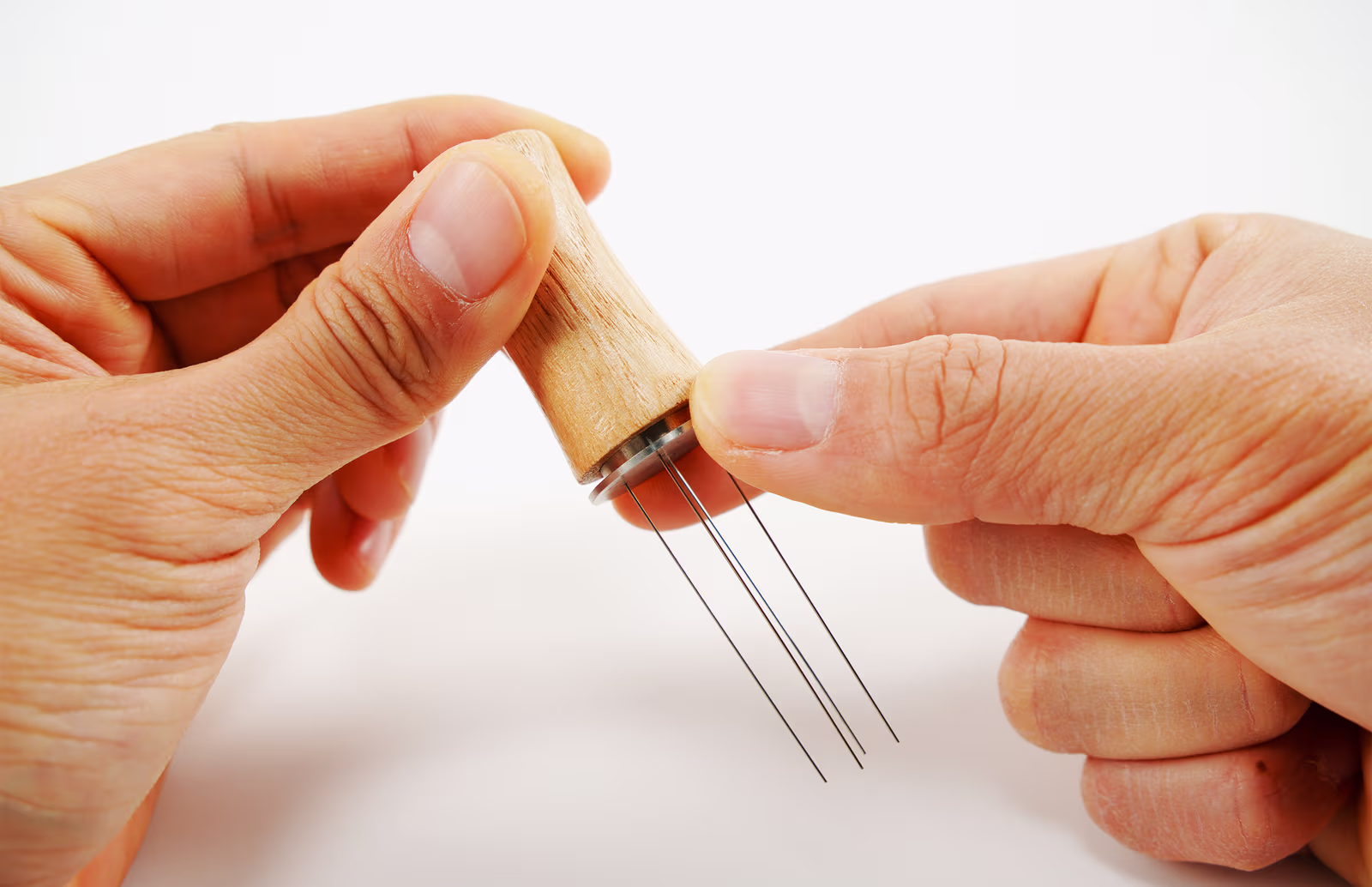 Removing the needles from the Puck Rake