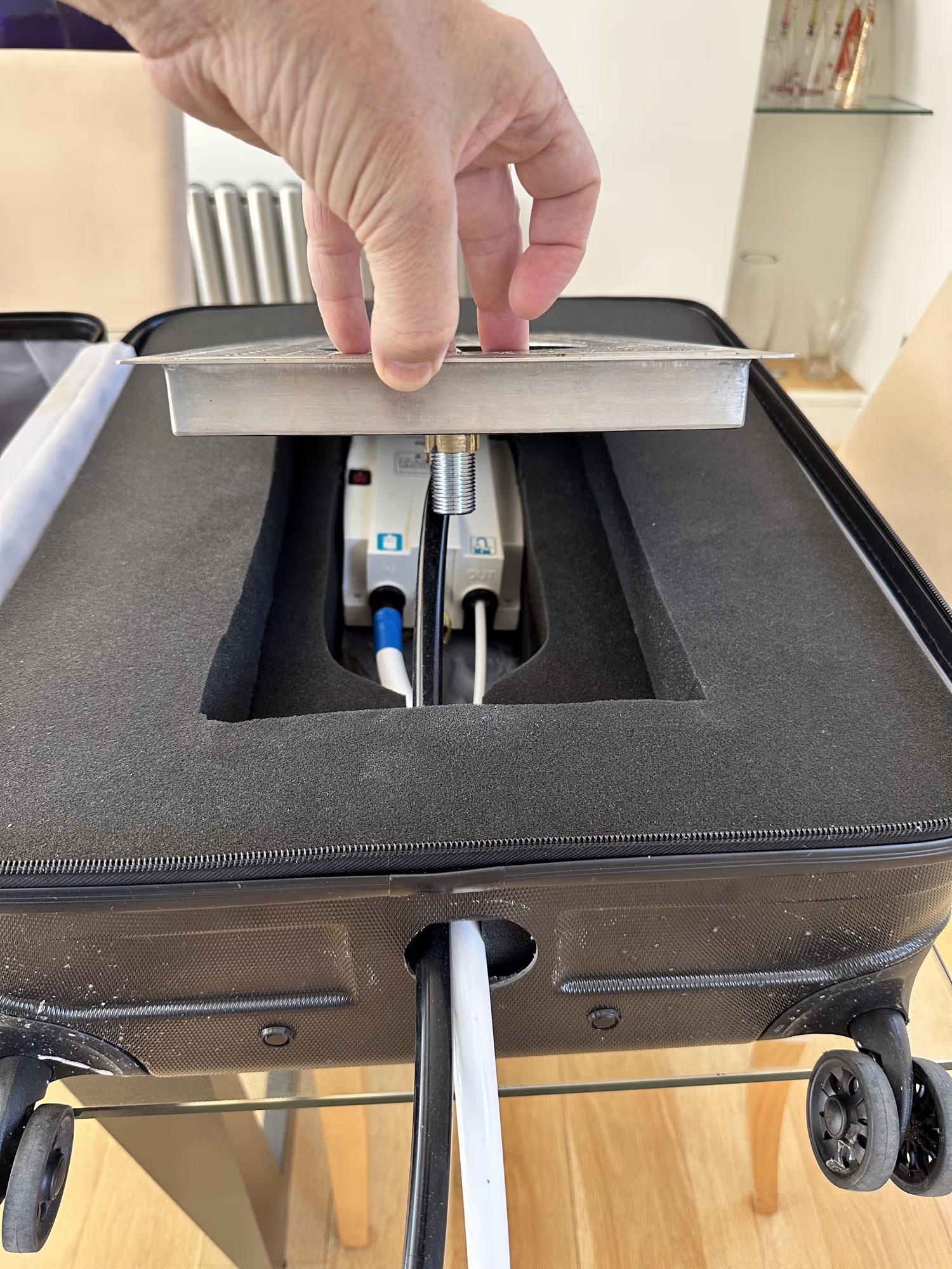 Pitcher rinser in suitcase