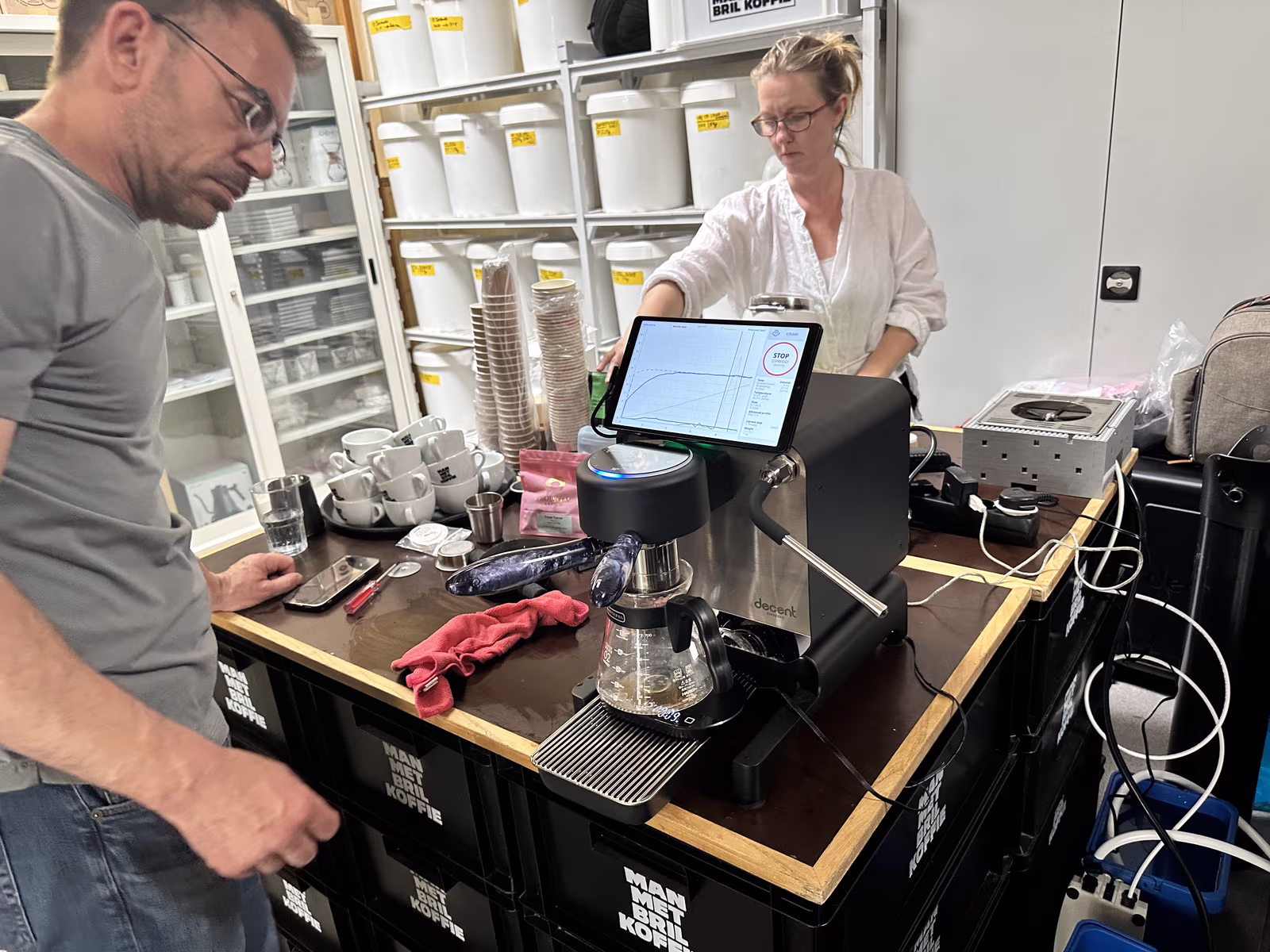 The countertop pitcher rinser in use